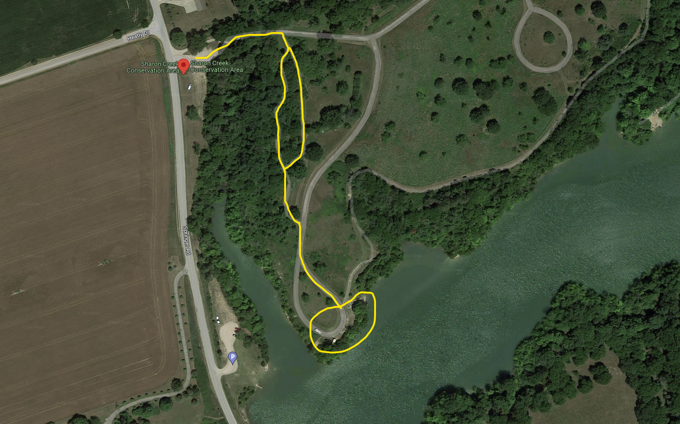 Map showing satellite view of Sharon Creek Conservation area with routes from North parking lot to canoe area drawn